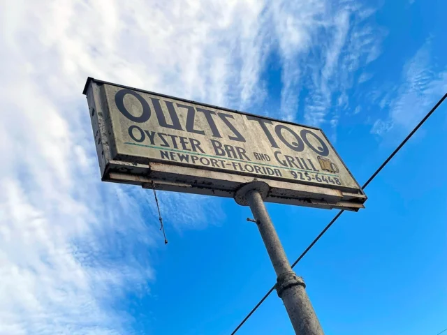 a photo essay from a dank, highly-entertaining, friendly, deep-backwoods florida roadhouse - OUZTS TOO!, where the high lifes go for $2/bottle, where there is a clear sense of community service in helping to capture Dirty Sanchez and a lil install 😉 of a blackened george in a most prestigious location